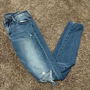 Old Navy Rockstar Mid-rise denim jeans ripped.